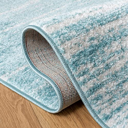SAFAVIEH Adirondack Collection Area Rug - 5'5" x 7'7", Aqua & Ivory, Modern Ombre Design, Non Shedding & Easy to Clean, Ideal for Living Room, Bedroom, Office, Dining Space (ADR113J)
