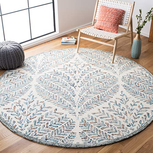 SAFAVIEH Capri Collection Area Rug - 9' Round, Ivory & Blue, Handmade Wool, Ideal for High Traffic Areas in Living Room, Bedroom (CPR208A)