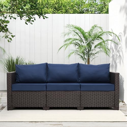 Brown wicker 3 seat outdoor sofa with navy blue cushions, view 2