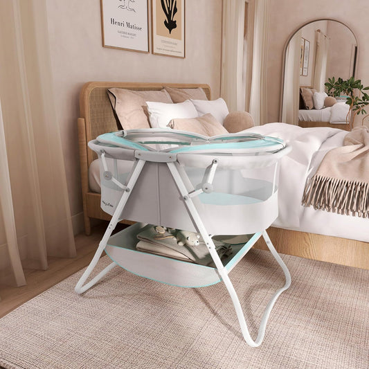 Karley Bassinet, Award Winner Lightweight Travel Baby Bassinet, Foldable Bedside Sleeper, Adjustable Double Canopy, Spacious Design, Soft Fabric, Storage Basket – Blue and Grey