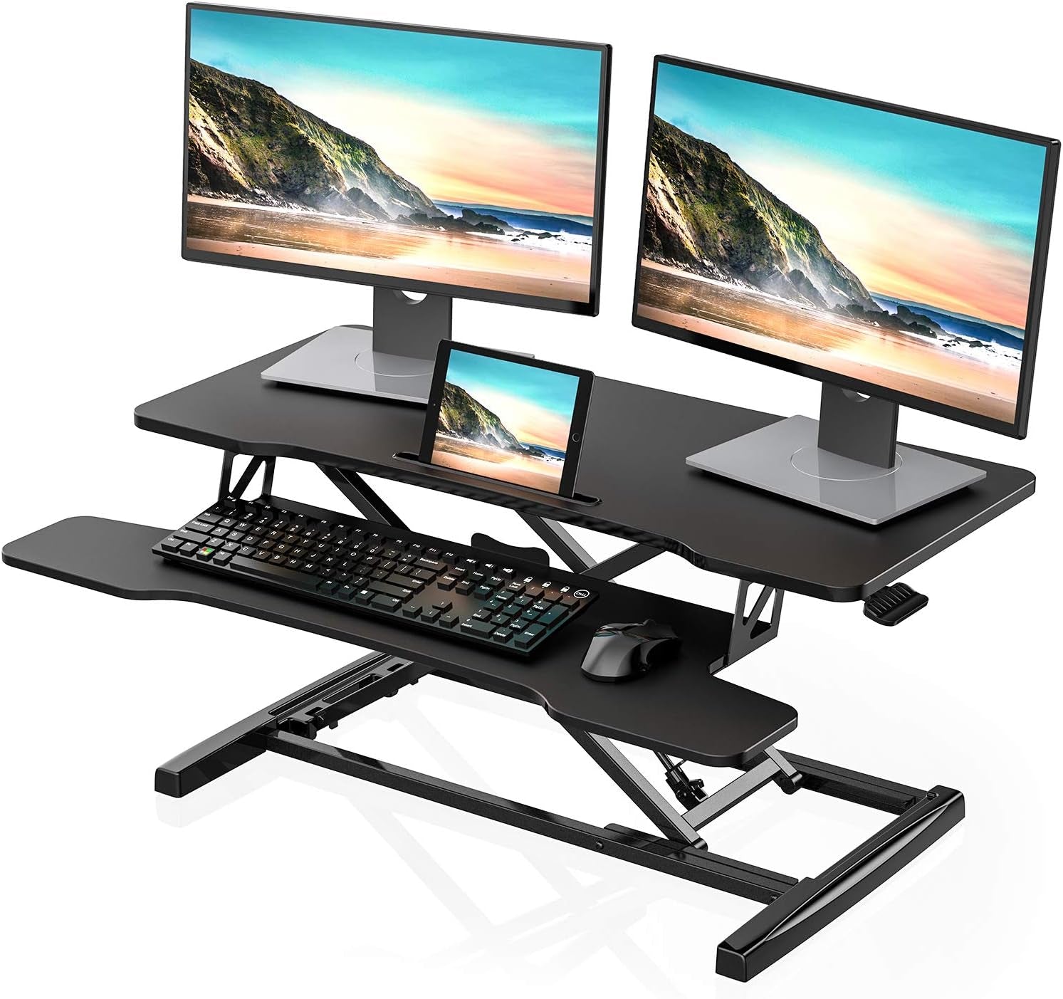 Black sit to stand desk converter for laptops and dual monitors