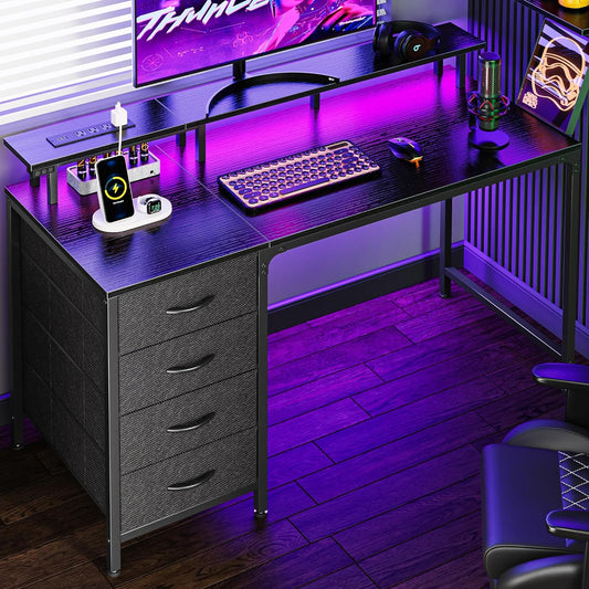 47 Inch Computer Desk with Power Outlets and LED Lights, Gaming Desk with 4 Drawers, Office Desk with Monitor Stand, Study Work Home Office, Small Spaces, Black