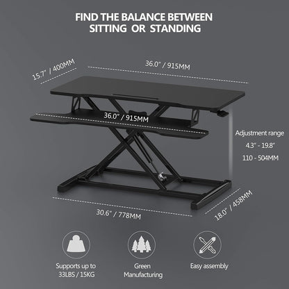 Black sit to stand desk converter for laptops and dual monitors, view 4