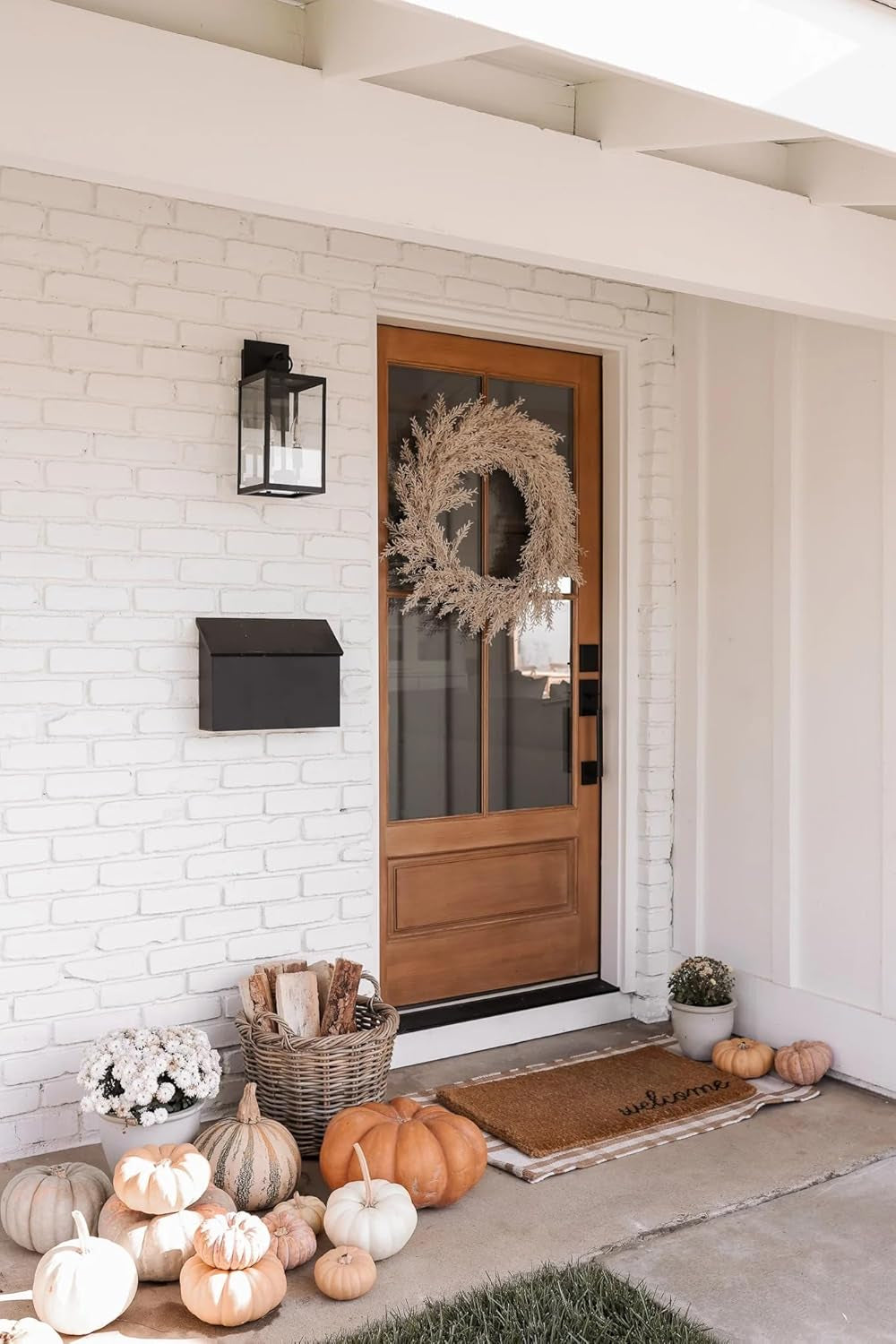 Ferris Outdoor Black Wall Sconce Light Fixture, Porch Lantern for Exterior with Iron Frame and Clear Glass Shade, Black/Clear