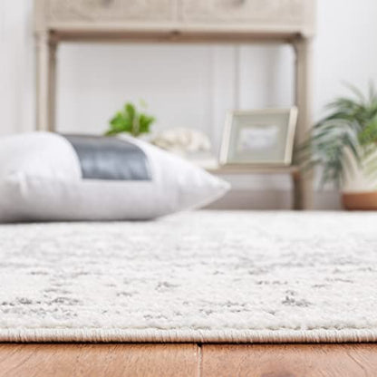 SAFAVIEH Madison Collection Area Rug - 6'7" x 9'2", Silver & Ivory, Snowflake Medallion Distressed Design, Non-Shedding & Easy Care, Ideal for High Traffic Areas in Living Room, Bedroom (MAD603G)