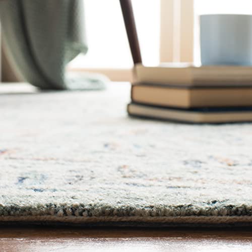 SAFAVIEH Capri Collection Area Rug - 9' Round, Ivory & Blue, Handmade Wool, Ideal for High Traffic Areas in Living Room, Bedroom (CPR208A)