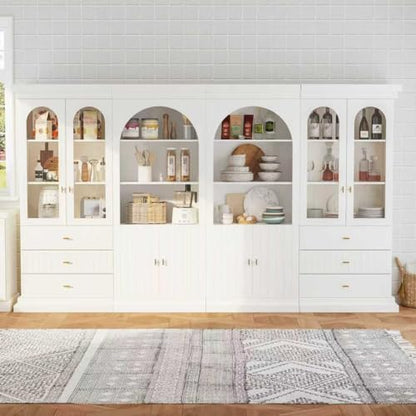 White arched kitchen pantry cabinet with gold handles, dual glass doors and open shelves, view 2