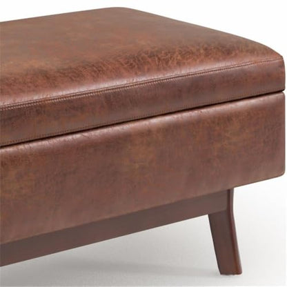 36" Faux Leather Storage Ottoman, Saddle Brown, Mid Century Design, Exposed Solid Wood Base, Lift-Up Lid with Child-Safety Hinge, Cushioned Top, Living Room or Family Room Furniture
