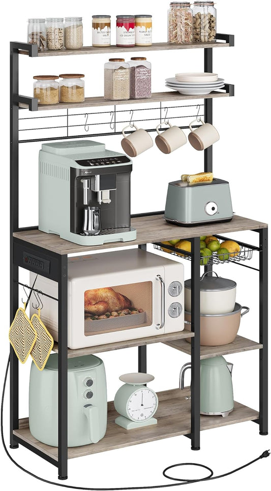 Bakers Rack with Power Outlet, 35.4 Inches Microwave Stand, Coffee Bar, 4 AC Outlets, with Adjustable Shelves, 8 S-Hooks, Basket, Spice Racks, Heather Greige and Ink Black UKKS031K02