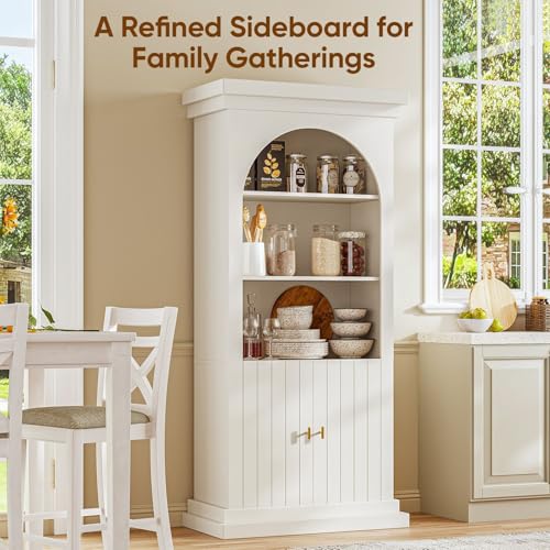 White arched kitchen pantry cabinet with gold handles, dual glass doors and open shelves, view 4