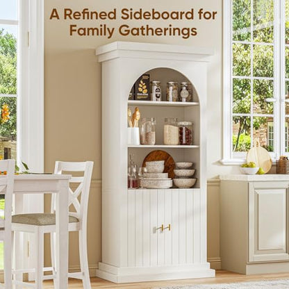 White arched kitchen pantry cabinet with gold handles, dual glass doors and open shelves, view 4