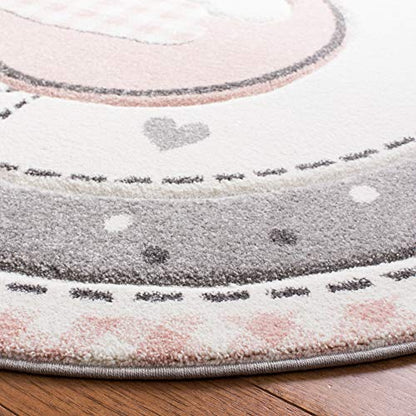 SAFAVIEH Carousel Kids Collection Area Rug - 5'3" Round, Pink & Ivory, Non-Shedding & Easy Care, Ideal for High Traffic Areas for Boys & Girls in Playroom, Nursery, Bedroom (CRK154P)