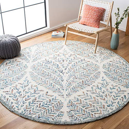 SAFAVIEH Capri Collection Area Rug - 9' Round, Ivory & Blue, Handmade Wool, Ideal for High Traffic Areas in Living Room, Bedroom (CPR208A)