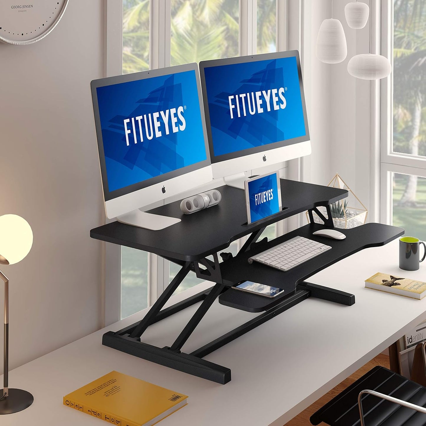 Black sit to stand desk converter for laptops and dual monitors, view 6