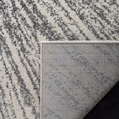 SAFAVIEH Evoke Collection Area Rug - 9' x 12', Black & Ivory, Abstract Burst Design, Non-Shedding & Easy Care, Ideal for High Traffic Areas in Living Room, Bedroom (EVK228K)