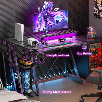 40 Inch Gaming Desk with Power Outlet & LED Lights, L Shaped Computer Gaming Table with 3 Tiers Storage Shelves, Corner Gamer Desk with Monitor Stand for Small Space, Carbon Fiber Black