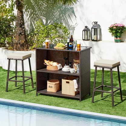 3Pcs Outdoor Bar Set, Patio Wicker Bar Furniture with 2 Storage Shelves, Glass Top Table, Cushions and Two Stools, Brown/Khaki