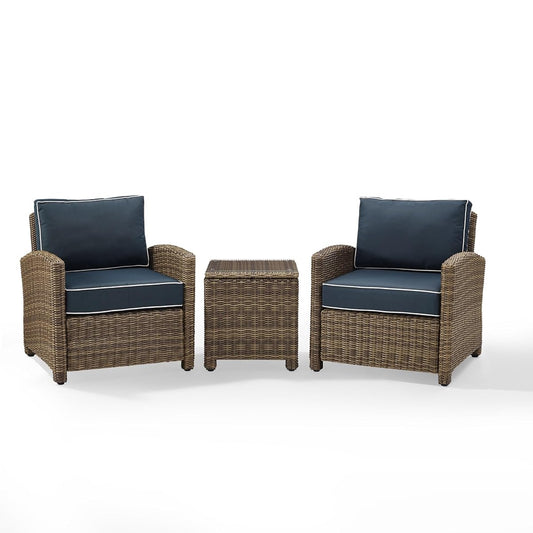 Weathered brown 3-piece wicker patio set with navy cushions