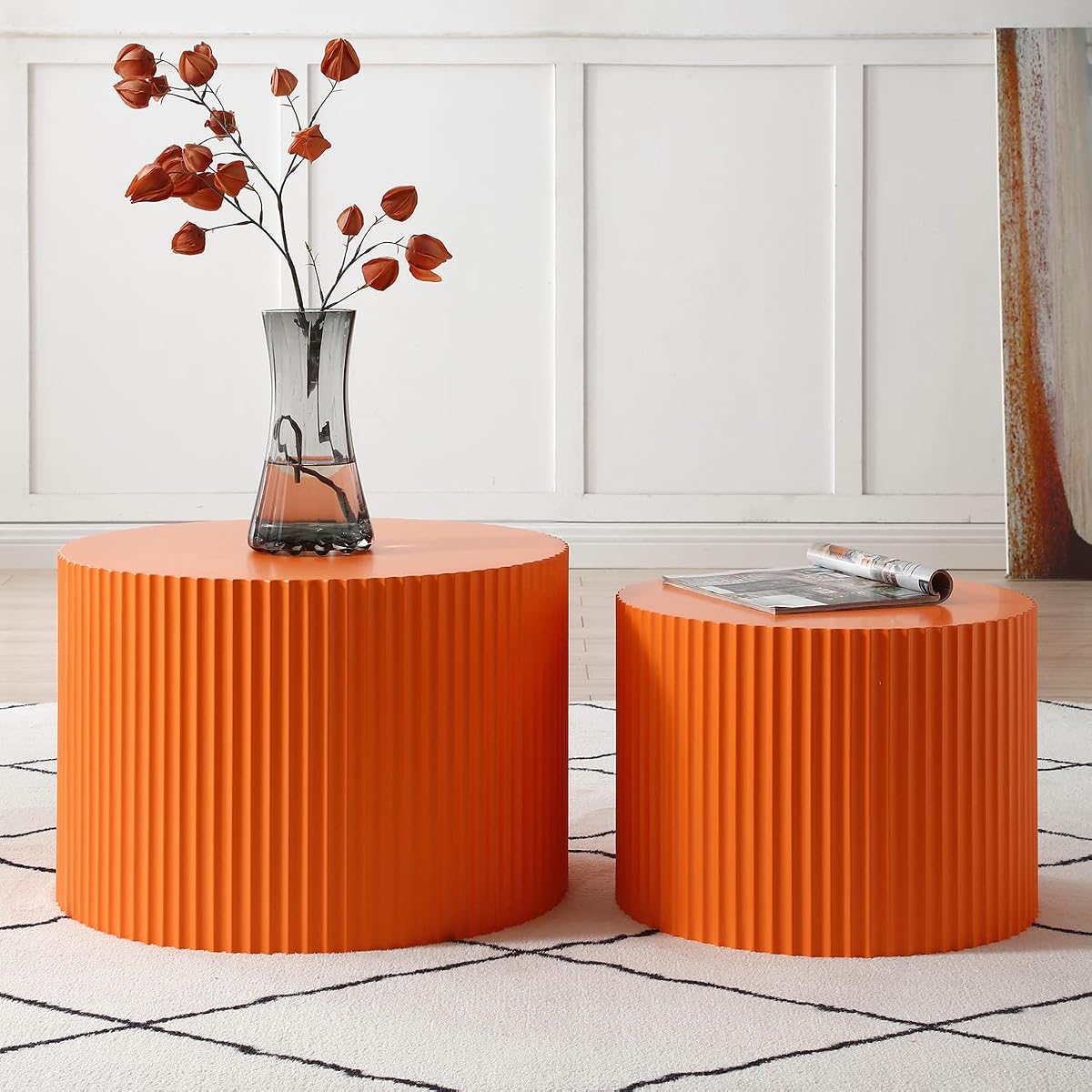 Set of two orange round nesting drum coffee tables