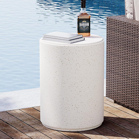 Spotted white round concrete outdoor side table