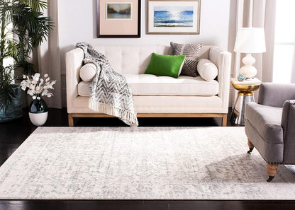 SAFAVIEH Madison Collection Area Rug - 6'7" x 9'2", Silver & Ivory, Snowflake Medallion Distressed Design, Non-Shedding & Easy Care, Ideal for High Traffic Areas in Living Room, Bedroom (MAD603G)