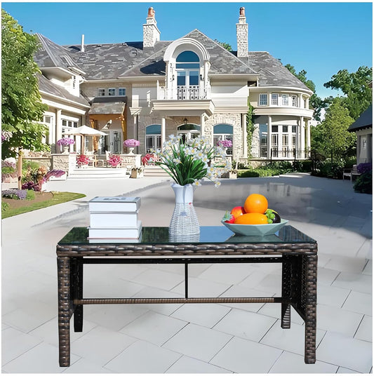 Brown wicker outdoor coffee table with tempered glass top