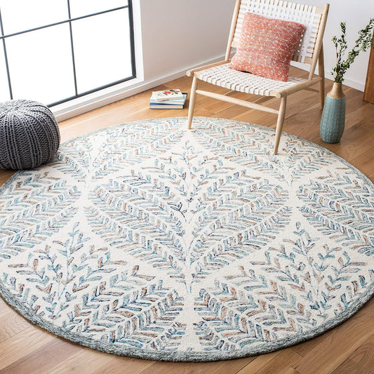 SAFAVIEH Capri Collection Area Rug - 9' Round, Ivory & Blue, Handmade Wool, Ideal for High Traffic Areas in Living Room, Bedroom (CPR208A)