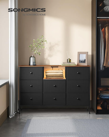 Dresser for Bedroom, Fabric Dresser with Power Outlets and LED Lights, TV Stand for up to 60 Inch Tvs, 25 Colors, 11.8 X 47.2 X 31.3 Inches, Ink Black and Rustic Brown ULTS518B01