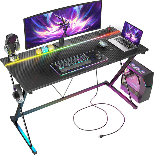 Gaming Desk with Power Outlets & LED 40 Inch Ergonomic Computer Carbon Fiber Surface Gamer Desk, PC Workstation with Headphone Hook for Bedroom, Kids Desk Gift for Boys, Black