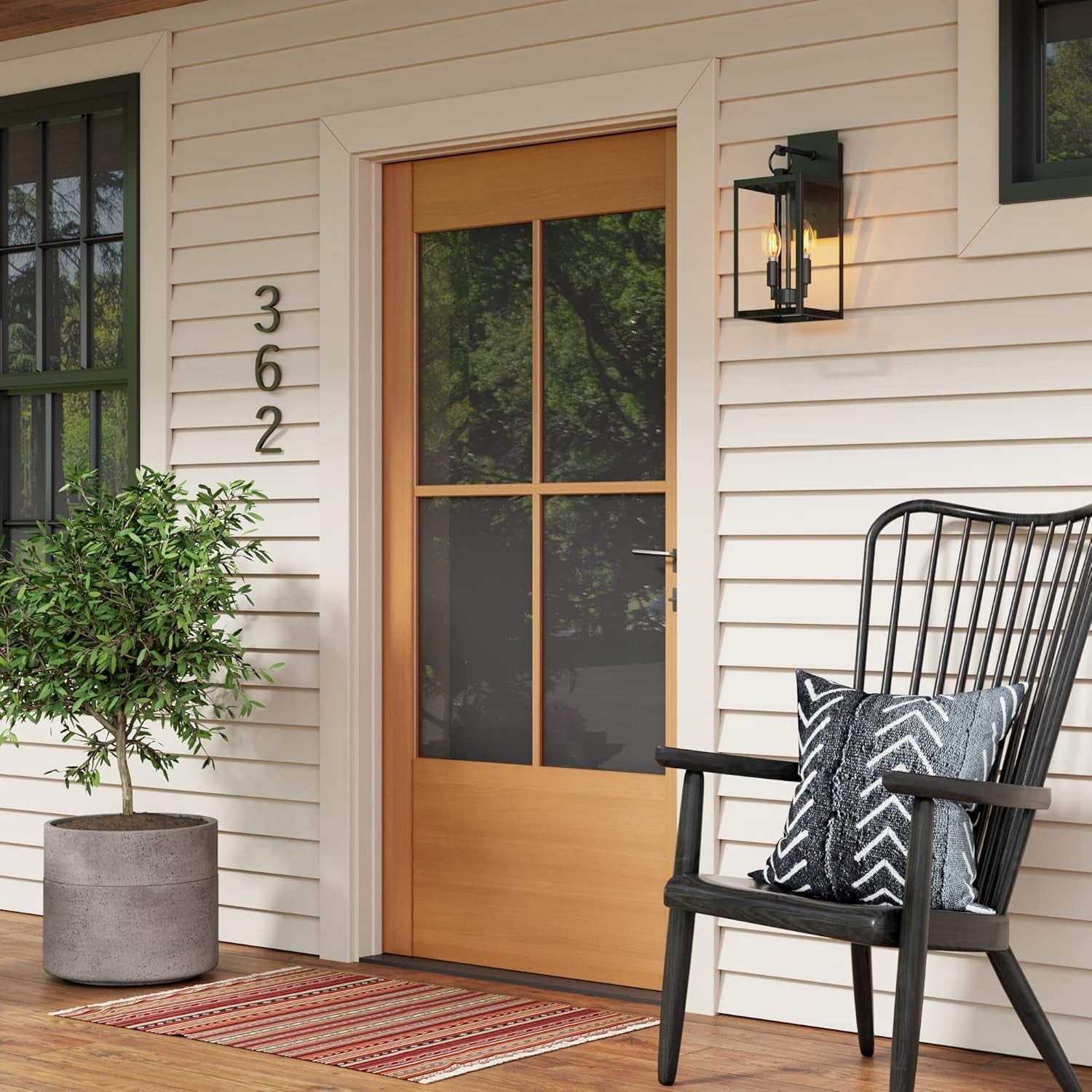 Ferris Outdoor Black Wall Sconce Light Fixture, Porch Lantern for Exterior with Iron Frame and Clear Glass Shade, Black/Clear