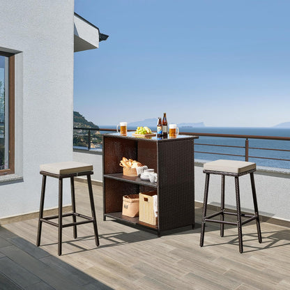 3Pcs Outdoor Bar Set, Patio Wicker Bar Furniture with 2 Storage Shelves, Glass Top Table, Cushions and Two Stools, Brown/Khaki