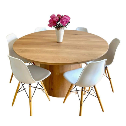 Handcrafted round white oak pedestal dining table with six chairs, made to order in the USA by Hawkins Woodshop